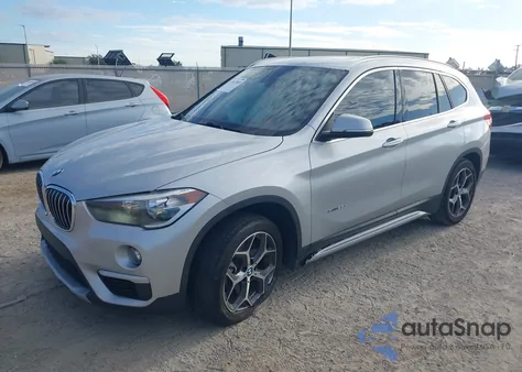 2018 BMW X1 xDrive28I z USA, uszkodzony, nr VIN WBXHT3C36J5K24933
